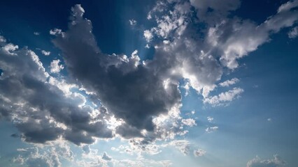 Wall Mural - blue sky white clouds. puffy fluffy white clouds. cumulus cloud cloudscape timelapse. summer blue sk