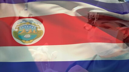 Poster - Animation of costa rica flag over diverse male and female surgeon performing operation at hospital