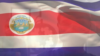 Poster - Animation of waving costa rica flag against portrait of diverse male and female surgeon at hospital