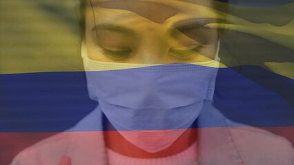 Poster - Animation of waving colombia flag against portrait of asian woman in face mask on the street