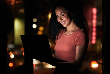 Poster - Laptop, office and business woman at night in dark online for typing email, website and browse internet. Creative agency, working late and happy person on computer for planning, research and review