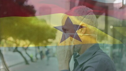 Poster - Animation of waving ghana flag against portrait of asian woman wearing face mask on the street