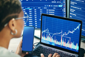 Poster - Person, phone and laptop on stock market in fintech, trading or online business finance at office. Employee, broker or financial advisor on mobile smartphone or computer for profit, app or growth