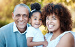 © Anela/peopleimages.com - Grandfather, mother and portrait of child in park together for bonding, relationship and fun. Happy family, love and mom, senior grandpa and girl outdoors relax on holiday, weekend and vacation