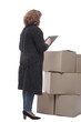 © ASDF - in full growth. serious woman signs documents after delivery.