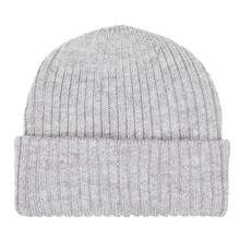 Gray knitted winter bobble hat of traditional design isolated