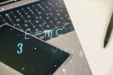 Poster - Double exposure of creative scientific formula concept on laptop background, research and development concept