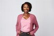 Portrait of a Kenyan woman in her 40s wearing a chic cardigan against a white background