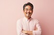 © Anne-Marie Albrecht - Portrait of a confident Japanese man in his 40s wearing a foulard against a pastel or soft colors background