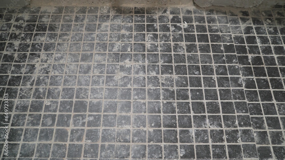 Image result for Small ceramic tiles have been washed on the floor, and the bathroom has ...