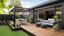 The Renovation Of A Modern Home Extension Includes The Addition Of A Deck, Patio, And Courtyard Area.