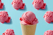 Juicy Ice Cream Cone and Raspberry ice cream
pattern on pastel blue color background. Trendy
summer concept with frozen Strawberry ice
cream cone.