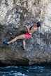 Women climbing. No rope, action sport. Excitement. 