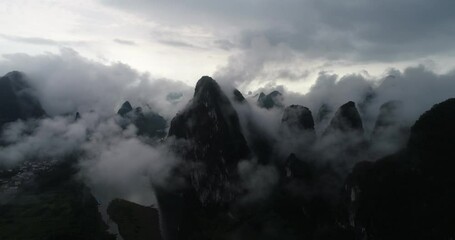 Wall Mural - The natural scenery of karst mountain peaks in the morning fog in Xingping Town, Yangshuo County, Guilin, Guangxi, China