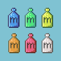 Fototapete - Pixel art sets of milk in bottle with variation color item asset. simple bits of milk drink on pixelated style 8bits perfect for game asset or design asset element for your game design asset