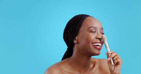 Wall Mural - Nose, makeup and brush with face of black woman in studio for cosmetics, tools and product. Foundation, salon and powder with person on blue background for skincare, beauty treatment and dermatology