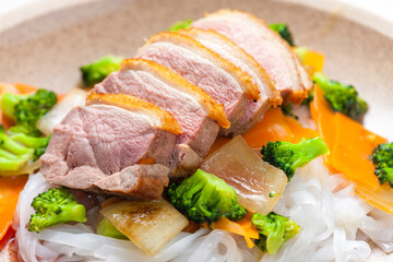 Canvas Print - baked duck breast with vegetables and rice noodles