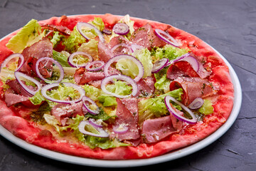 Sticker - pizza with red onion and bacon