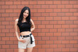 © reewungjunerr - Portrait of hipster girl  on brick wall background,Beautiful asian woman pose for take a photo,Kawaii style