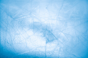 Wall Mural - Cracked blue ice background 