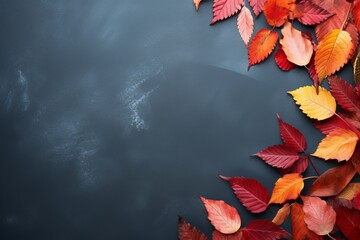 Canvas Print - autumn red leaves in blue background with copy space