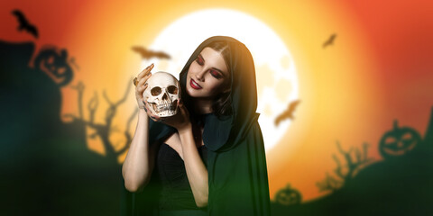 Wall Mural - Young witch with skull at the time of full moon