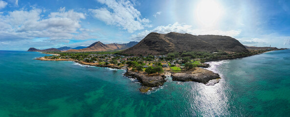 Wall Mural - The West Coasy of hawaii showing the Rugged Coast and a Small Town