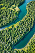 © birdmanphoto - Aerial view of the river in the forest. Beautiful summer landscape