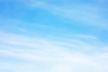 Wall Mural - Fantastic soft white clouds against blue sky and copy space horizontal shape