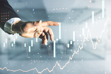 Poster - Double exposure of man hand clicks on abstract creative financial chart hologram on blurred office background, research and strategy concept