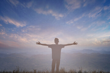 Wall Mural - Happy man rise hand on morning view. Christian inspire praise God on good friday background. Now one man self confidence on peak open arms enjoying nature the sun concept world wisdom fun hope.