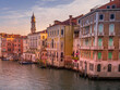 Venice Early Morning View from the Rialto Bridge, looking at the buildings by the side of the Grand Canal.