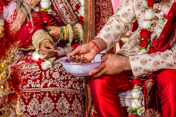 Indian Hindu wedding ceremony rituals hands close up