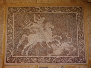 Wall Mural - Rhodes, Greece - April 21, 2023: Archeological Museum of Rhodes Town. beautiful vintage antique mosaics with mythical elements