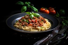 Pasta Bolognese With Basil In Plate On Dark Background. Rustic Style