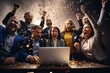 A group of multiethnic successful entrepreneurs is working together in the office. They are cheering with raised hands in front of alaptop screen with confetti falling around them.