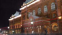 Enchanting Night Timelapse Of The Museum Of The Patriotic War Of 1812 At The Iconic Red Square In Moscow, Russia. The Museum Illuminated Against The Backdrop Of The Historical Setting