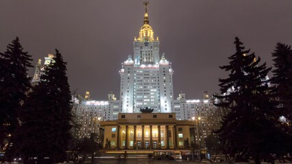 Wall Mural - The Main Building of Moscow State University on Sparrow Hills at Winter Night Hyperlapse. Illuminated Landmark in the Heart of Moscow, Russia