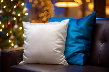 Wall Mural - White pillow on a sofa background with Christmas lights for mockups. Cozy winter interior.