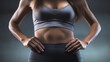 © redflower - Close-up view of a woman's waist in sports clothing