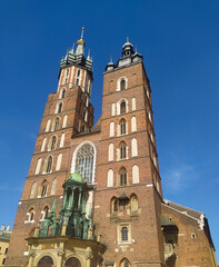 Wall Mural - Krakow, Poland - Facade of the St. Mary's Church in the main square of Krakow, on a sunny day