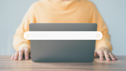 Poster - User working with a laptop computer on table in office. Search engine optimization the internet with search bar. Best SEO technology networking, Searching browsing internet data information concept.