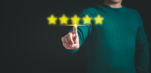 Poster - Customer hand touching the stars to complete five stars. Comment scores are good. Customer service assessment, testimonial, feedback, giving a five star rating. Service rating, satisfaction concept.