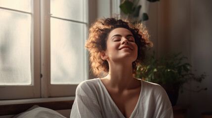 Poster - Young woman practicing lotus asana in yoga studio while meditating and smiling