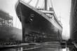 1910 vintage photo captures the construction of the Titanic in a dry dock. Black and white image showcases the majestic rise of this engineering marvel, a testament to ambition and skill. AI-generated