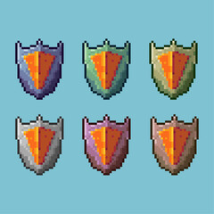 Fototapete - Pixel art sets of shield rpg game items with variation color asset. simple bits of shield defense on pixelated style 8bits perfect for game asset or design asset element for your game design asset