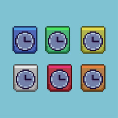 Fototapete - Pixel art sets of clock timer decoration with variation color item asset. simple bits of clock on pixelated style 8bits perfect for game asset or design asset element for your game design asset