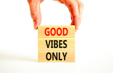 Wall Mural - Good vibes only symbol. Concept word Good vibes only on beautiful wooden block. Businessman hand. Beautiful white table white background. Business motivational good vibes only concept. Copy space.