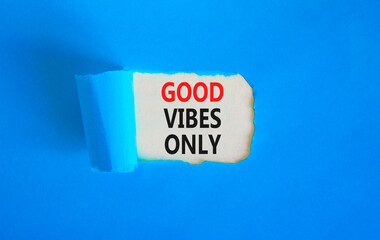 Wall Mural - Good vibes only symbol. Concept word Good vibes only on beautiful white paper. Beautiful blue table blue background. Business motivational good vibes only concept. Copy space.