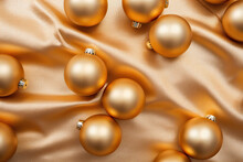 A Group Of Shiny Gold Christmas Ornaments On A Satin Background Created With Generative AI Technology